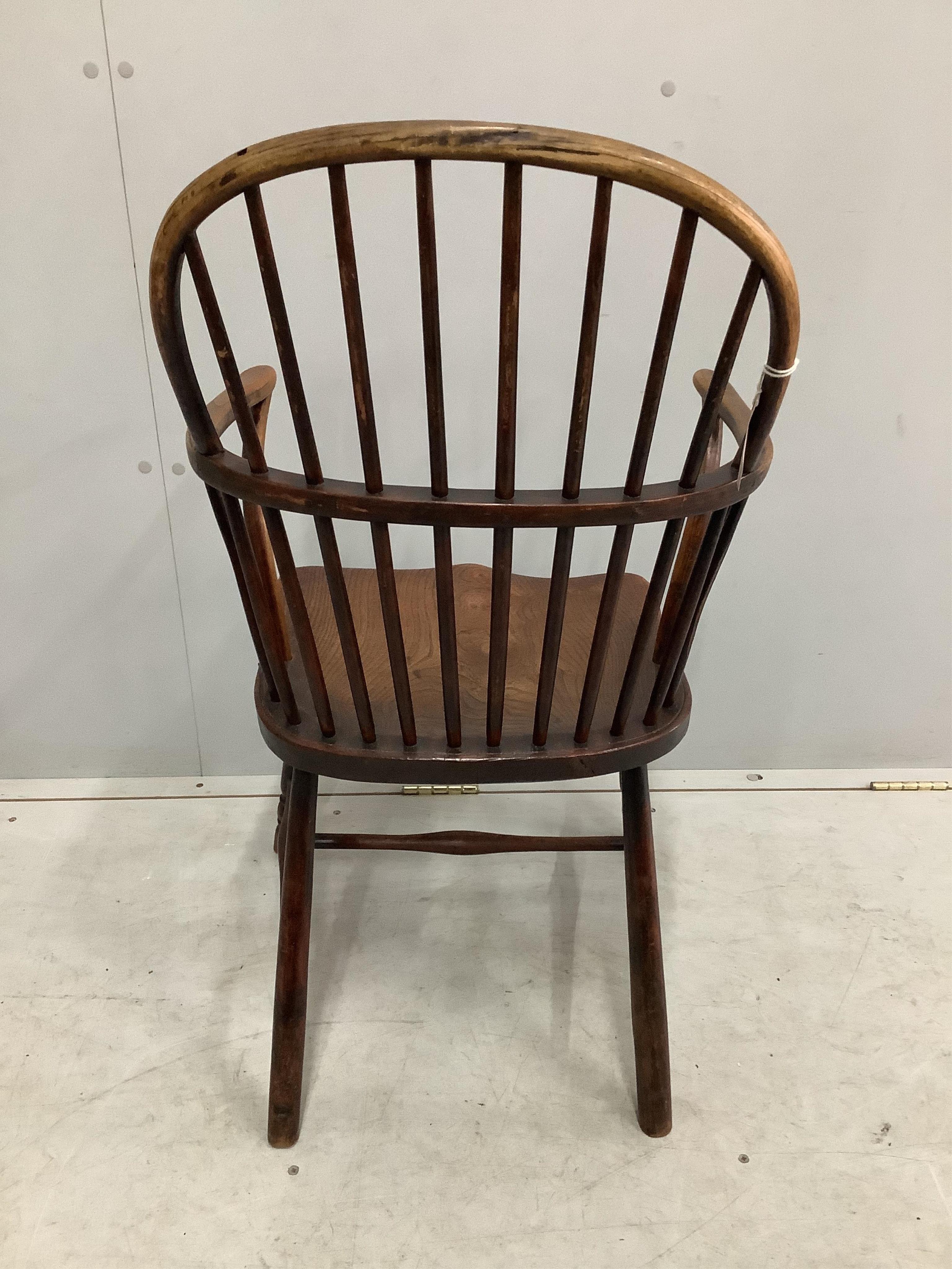 A 19th century Thames Valley elm and beech comb back Windsor elbow chair, width 49cm, depth 41cm, height 93cm. Condition - fair